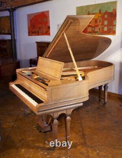 A 1906 Steinway Model B grand piano in satinwood with gate legs. 3 year warranty