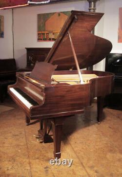 A 1930, Steinway Model M grand piano with a mahogany case. 3 year warranty