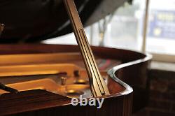 A 1975, Steinway Model O grand piano with a mahogany case. 3 year warranty