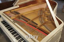 A 1979, Louis XV style, Steinway Model O grand piano with gilt detail