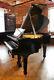 A Rebuilt, 1951, Steinway Model S Baby Grand Piano With A Black Case