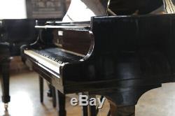 A rebuilt, 1951, Steinway Model S baby grand piano with a black case