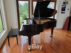 Baldwin grand piano model R in great condition with bench and QRS player system