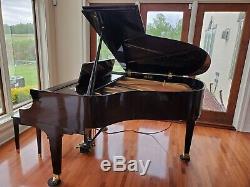 Baldwin grand piano model R in great condition with bench and QRS player system