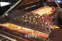 Rebuilt, 1886, Steinway Model D grand piano with a rosewood case & turned legs