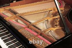 Rebuilt 1928, Steinway Model M grand piano in black. 5 year warranty