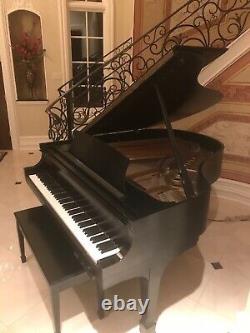 Steinway Baby Grand Model M piano in matte black with CD player