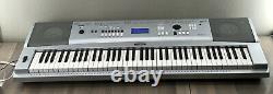 Yamaha Portable Grand Piano Keyboard Model DGX-230