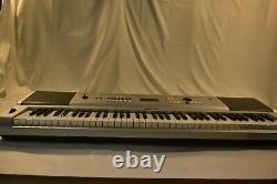 Yamaha Portable Grand Piano Keyboard Model DGX-230 Piano-focused 76-keys