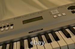 Yamaha Portable Grand Piano Keyboard Model DGX-230 Piano-focused 76-keys